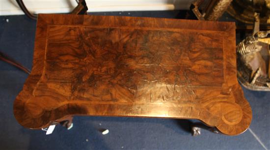 A fine George I figured walnut card table, W.2ft 10in. D.1ft 5in. H.2ft 5in.